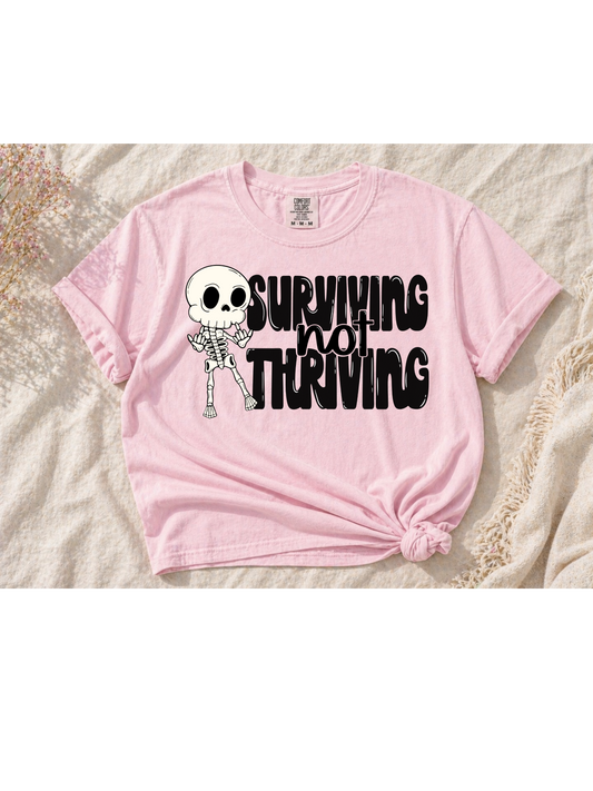 Surviving not thriving Tee